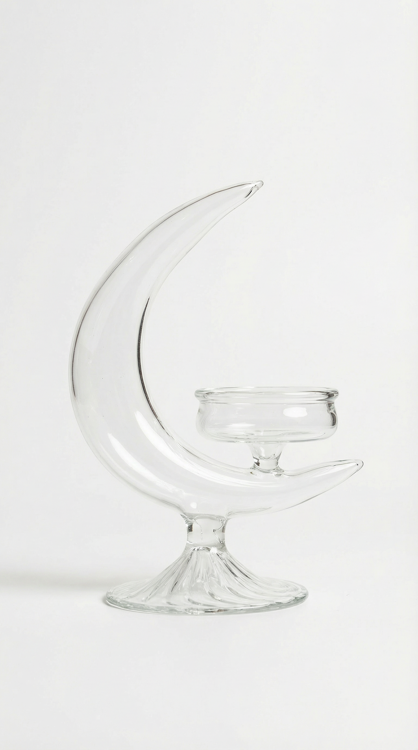 Clear blown glass moon candleholder by By Lea Sfeir for elegant table décor and luxury interiors