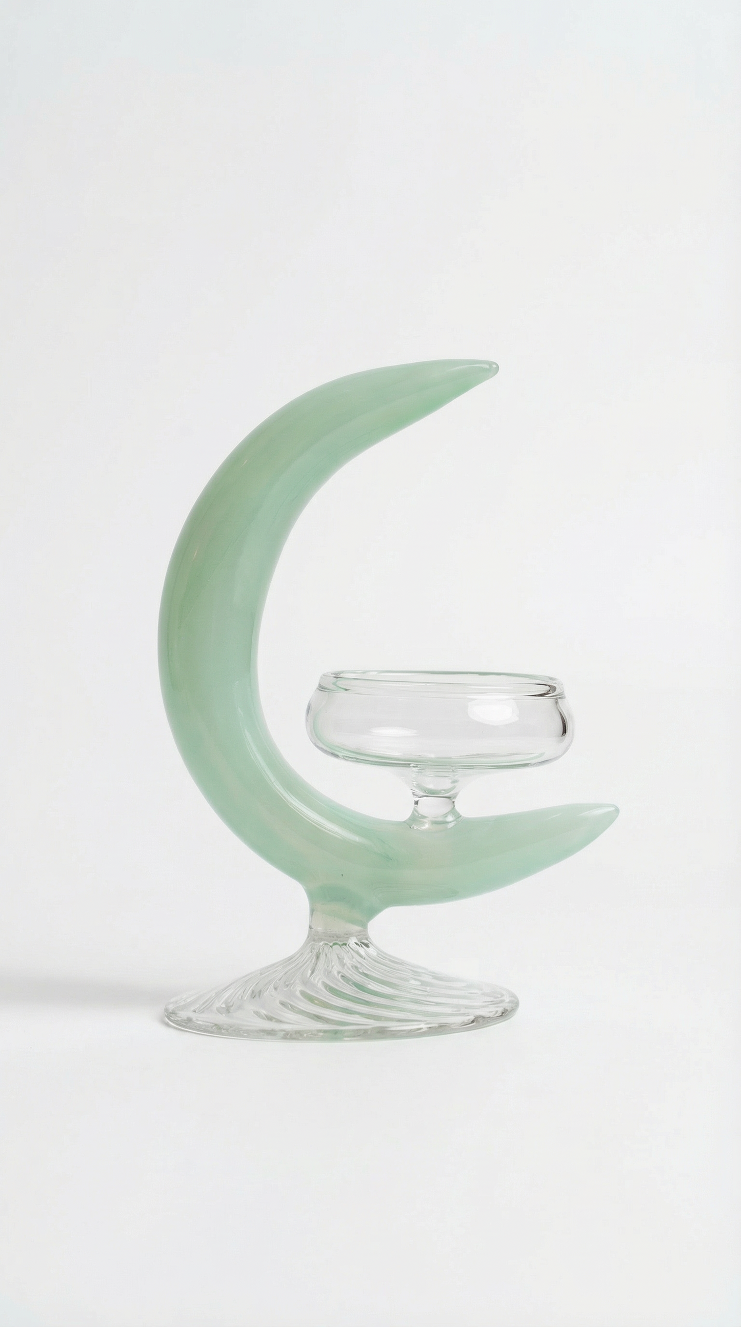 Green moon blown glass candleholder by By Lea Sfeir styled for elegant table décor and refined interiors